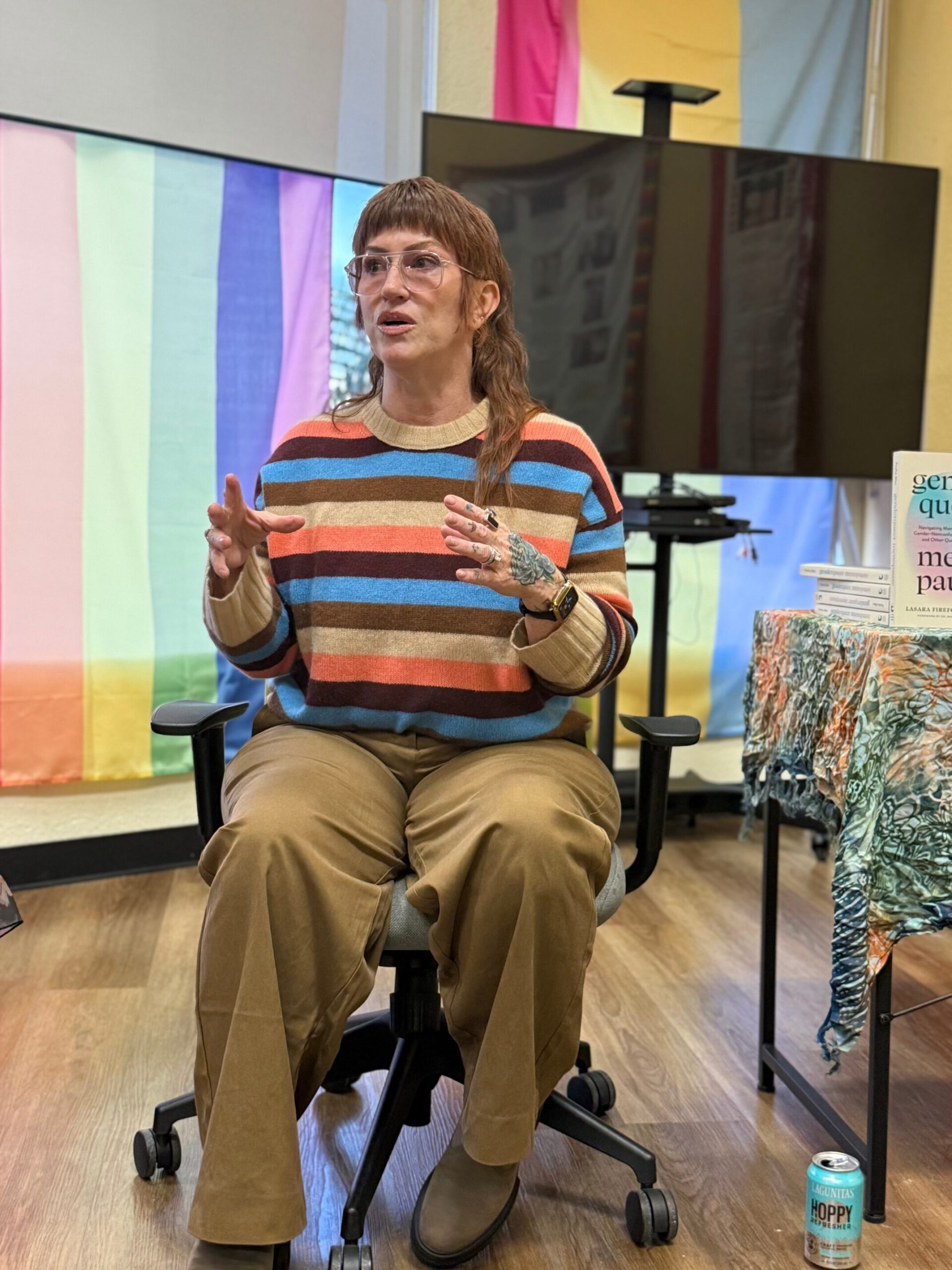 Lasara Firefox Allen, MSW, gender-affirming menopause speaker, leading a community book talk and conversation